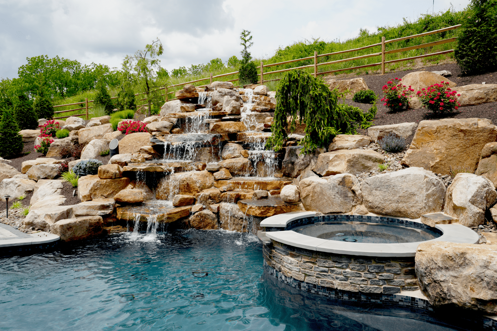 A pool with water features, including a waterfall.