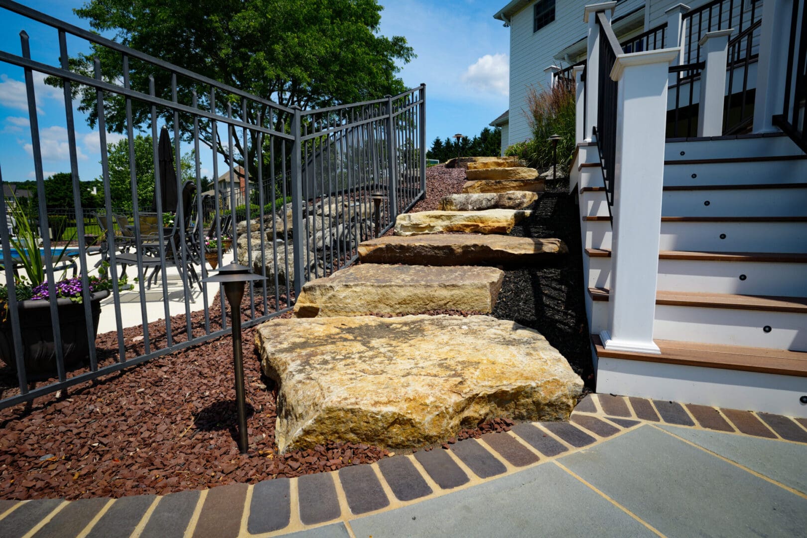 A stone staircase with steps leading to the top of it.