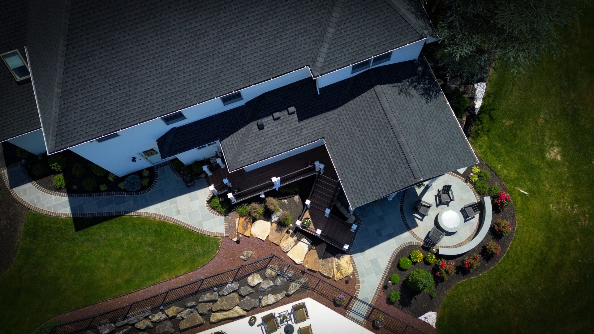 A bird 's eye view of a house with a garden.