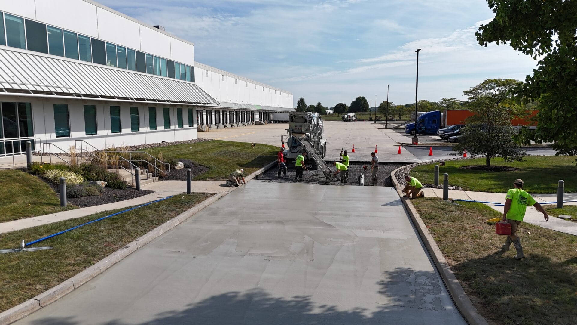 A group of people working on the side walk