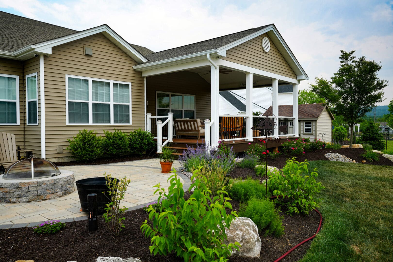 A house with a porch and patio area.