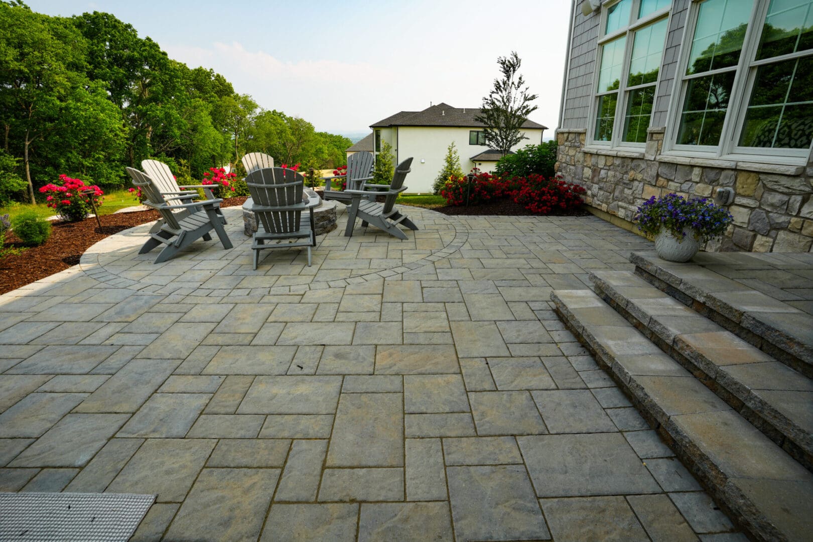 paver patio with steps to back door