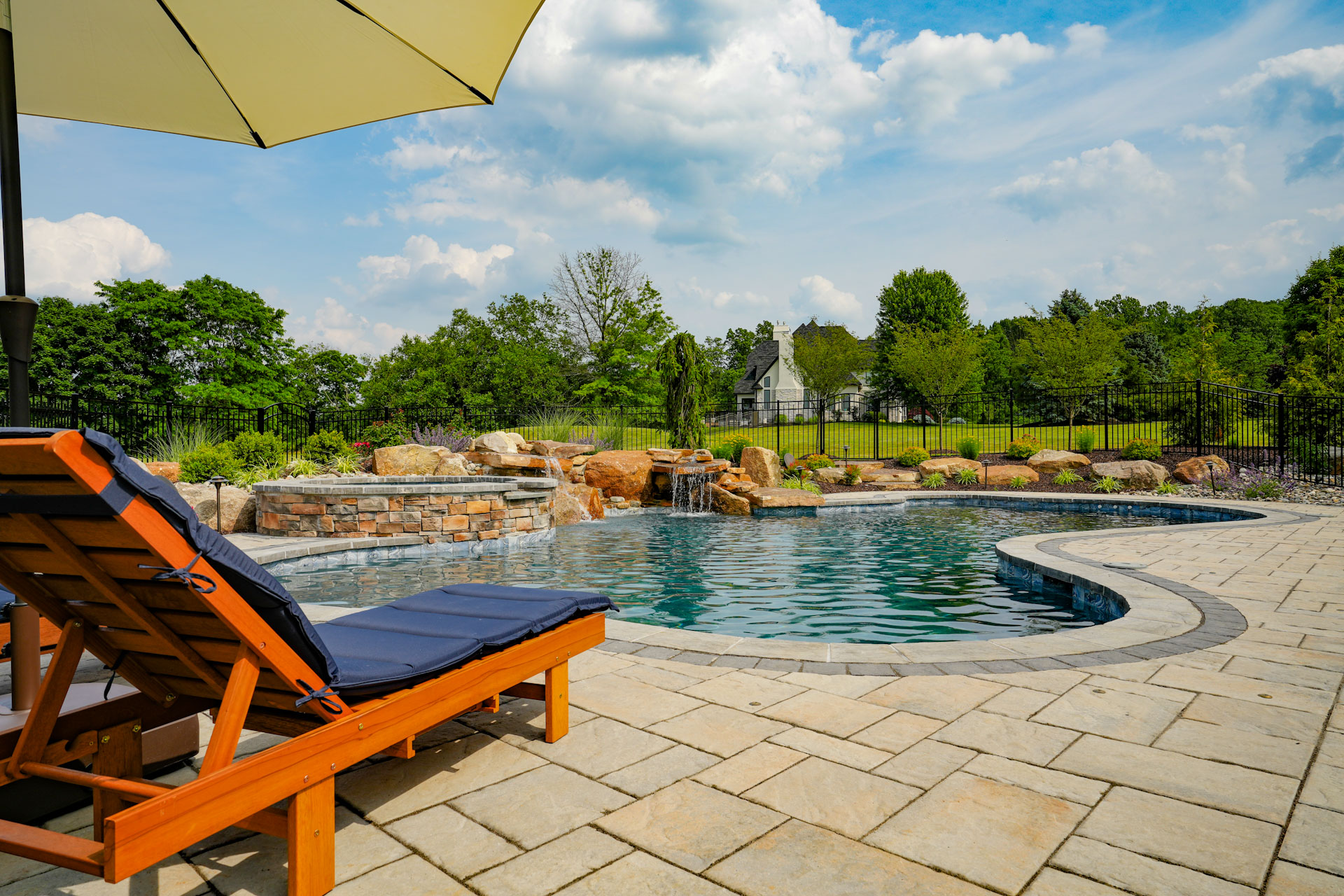 custom pool and spa with water feature